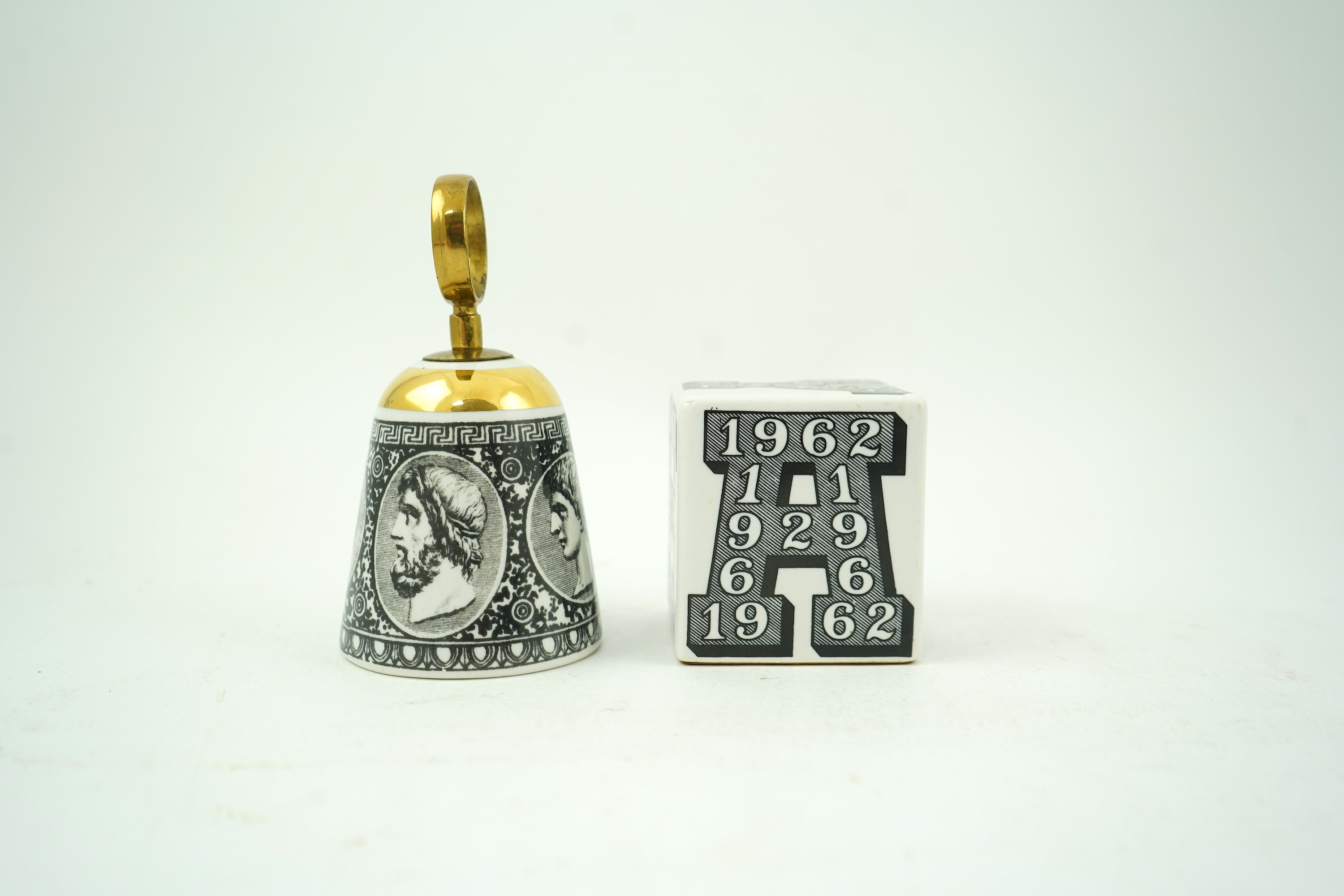 Piero Fornasetti (Italian, 1913-1988): A collection of Fornasetti desk items and dishes